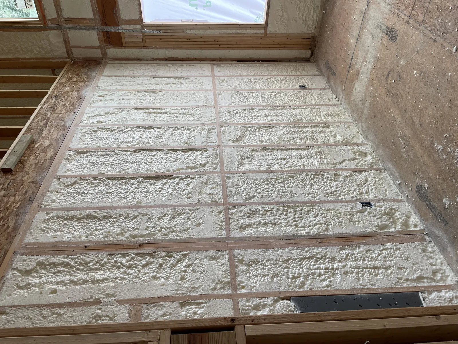 Spray foam insulation applied in a building