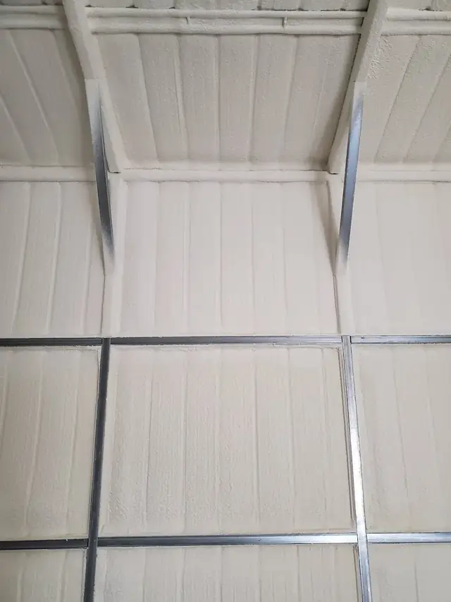 Spray foam insulation applied in metal building