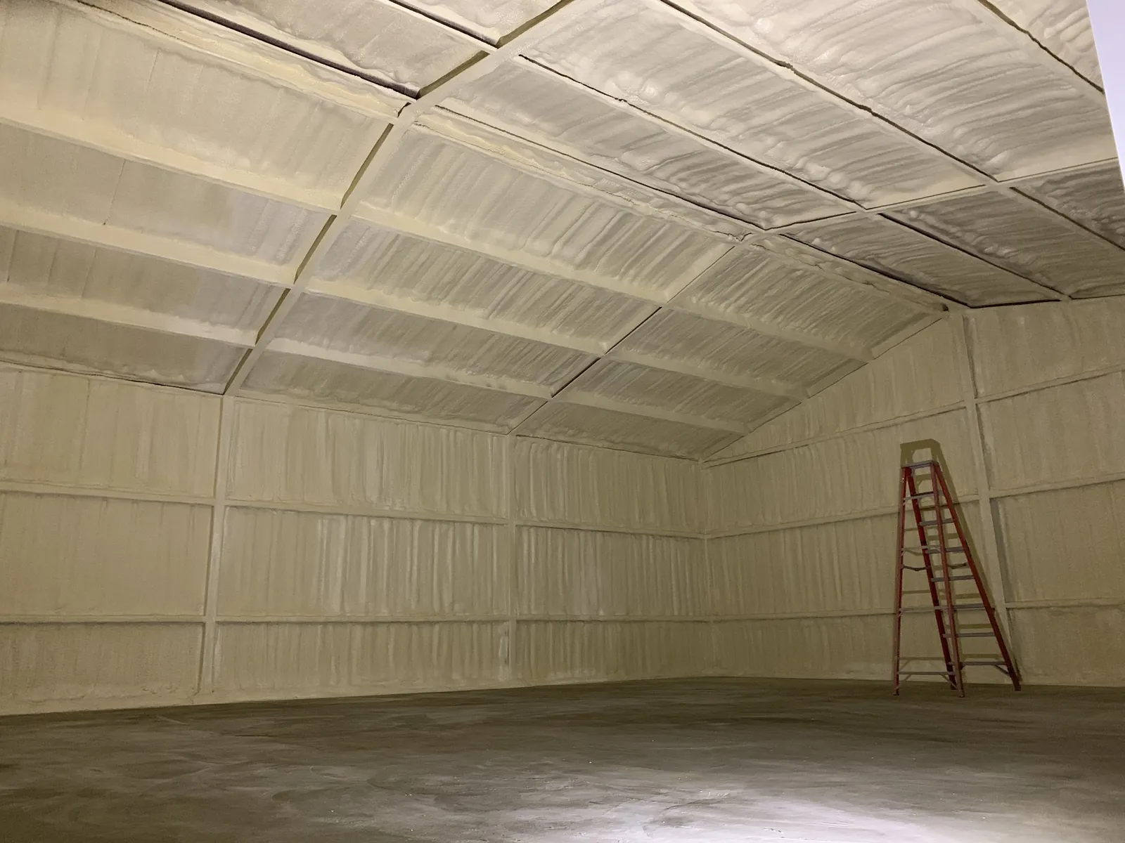 Spray foam insulation applied in a pole barn