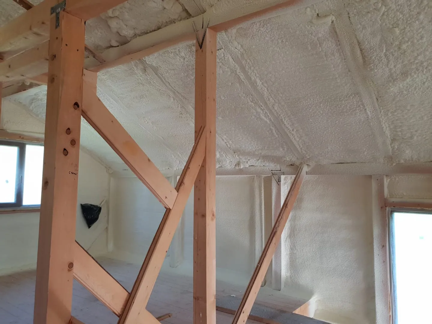 Spray foam insulation applied in a home