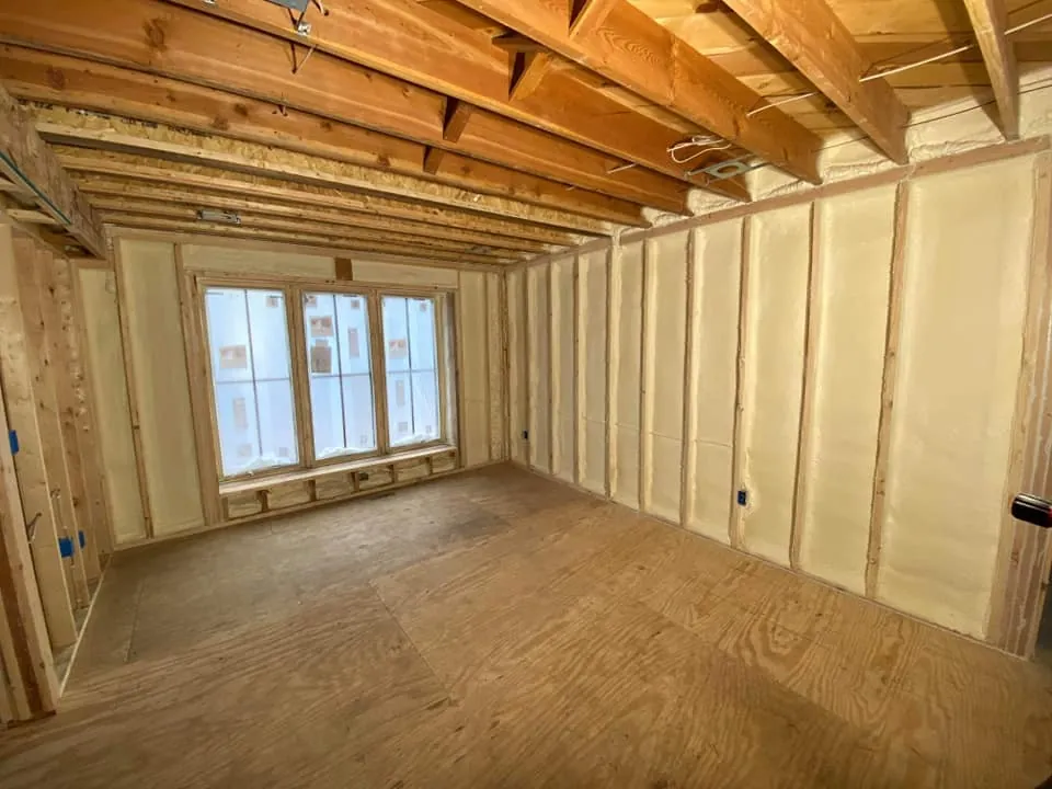 Spray foam insulation applied in a wall cavity